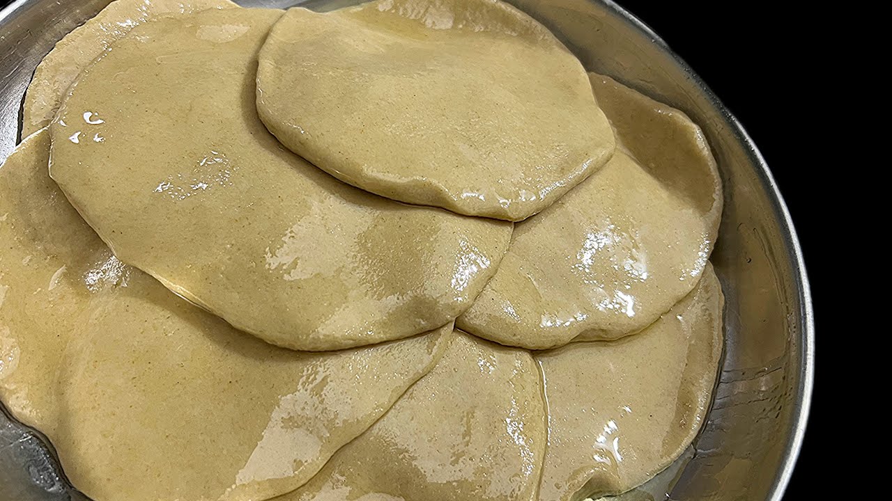 simple and easy method to make soft, layered porottas at home